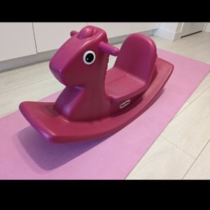 Toddler riding horse